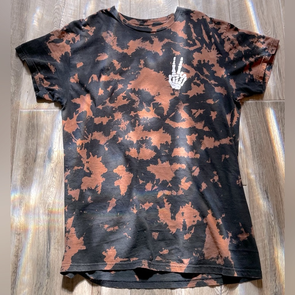 Tie-dye, black and brown T-shirt with a peace sign